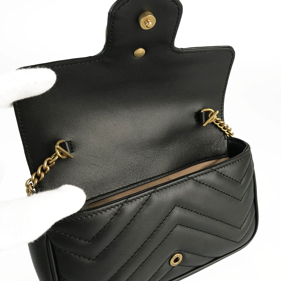 GUCCI: Marmont mini Pochette in quilted leather - Black