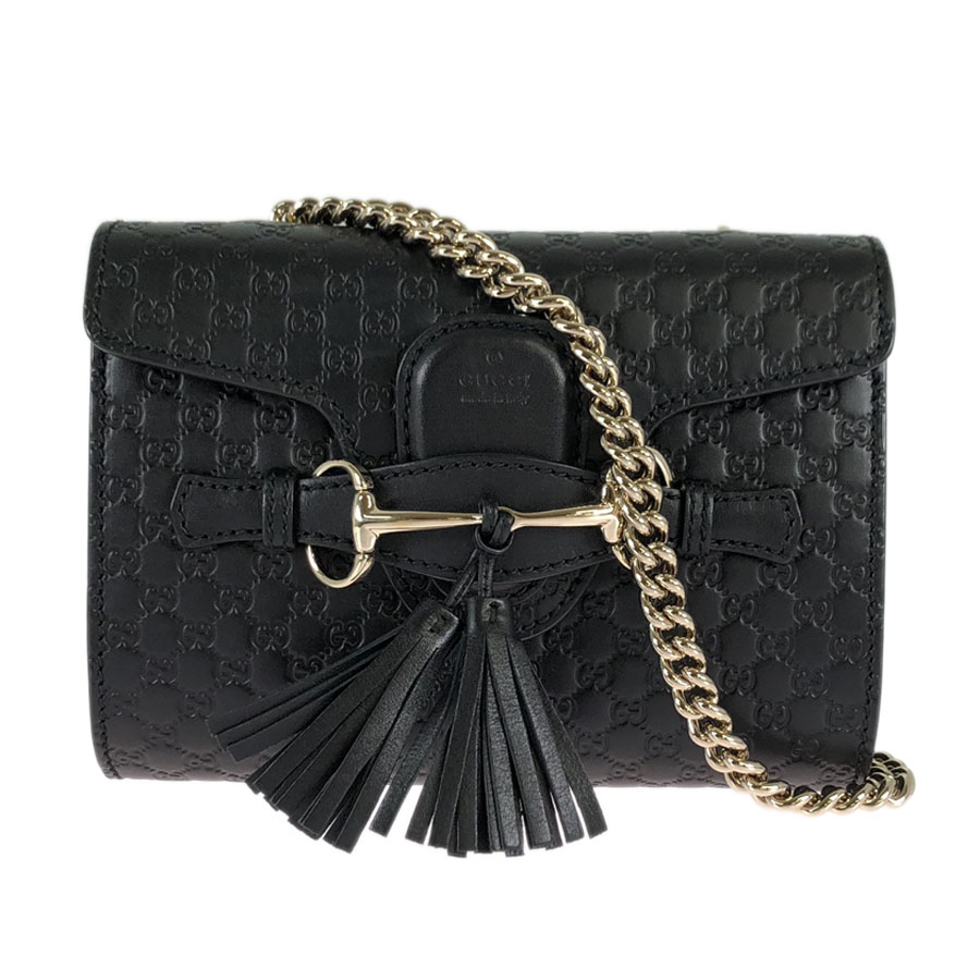 gucci black purse with tassels