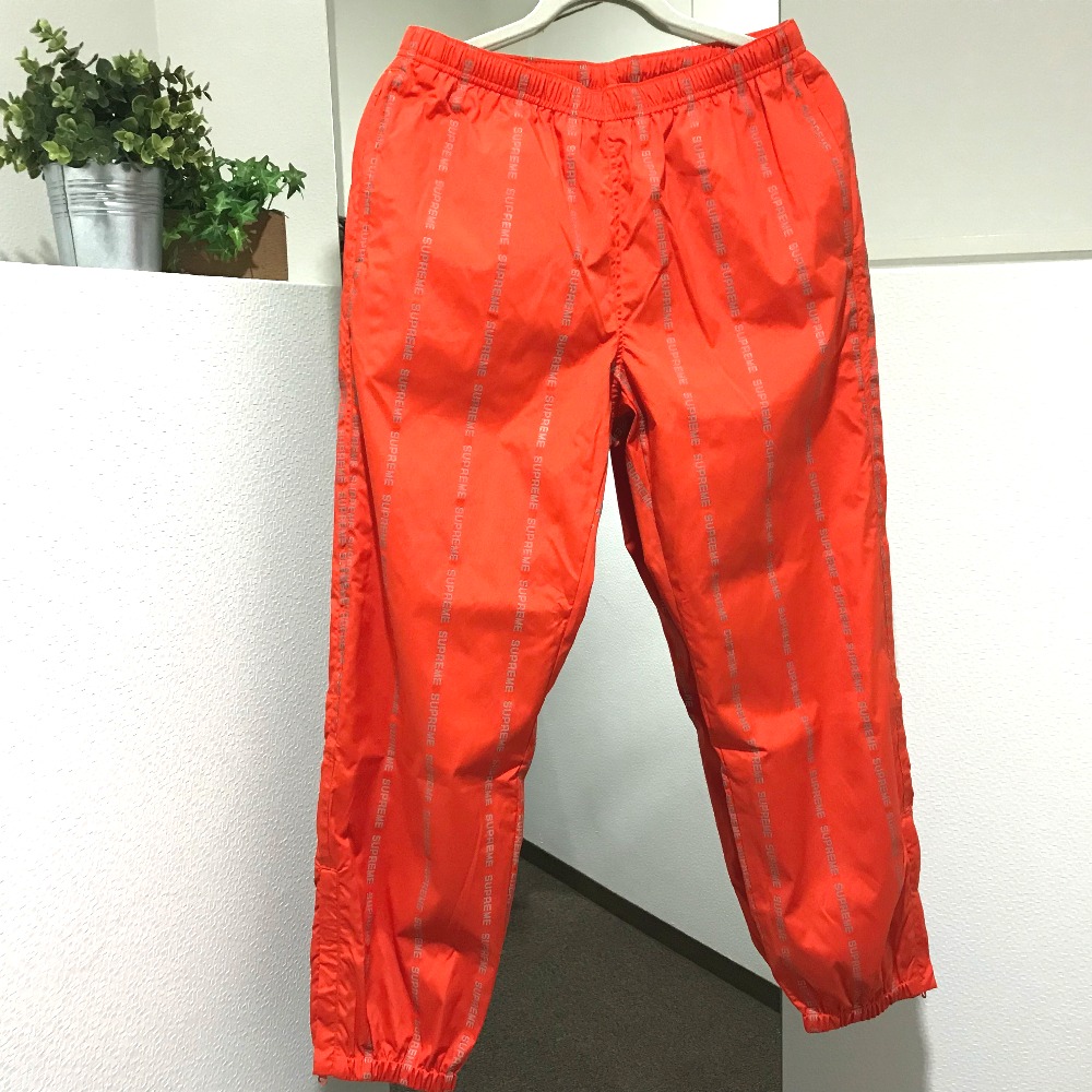 supreme reflective text track pant