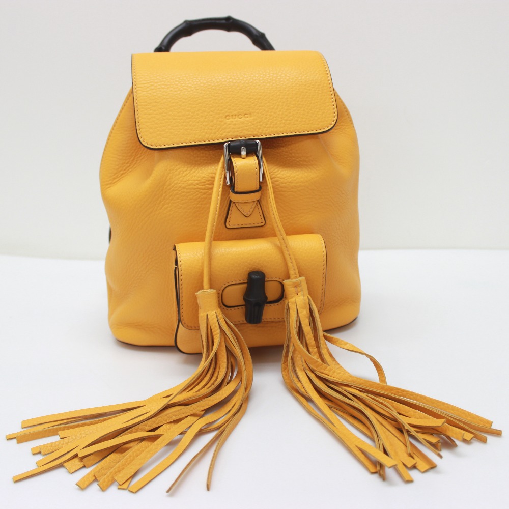 gucci backpack with yellow straps