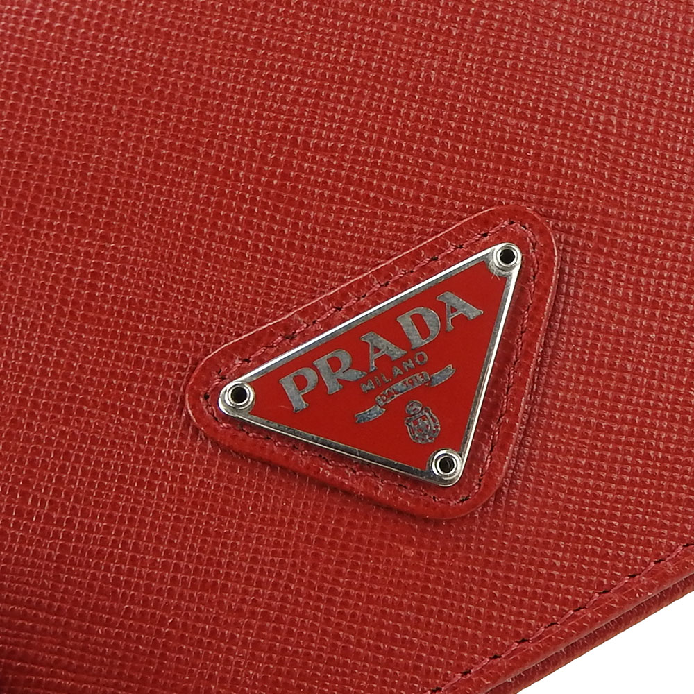 中古】 プラダ 二つ折り財布 レザー レッド シルバー金具 サフィアーノ コンパクト シンプル レディース 女性 PRADA｜PRADA プラダ ｜店舗買取｜財布/小物＞財布｜USEDのアパレル通販サイト - SMASELL（スマセル）