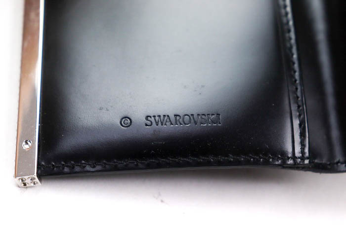 スワロフスキー カードケース 名刺入れ 二つ折り ブランド 小物 レディース ブラック SWAROVSKI  【中古】｜SWAROVSKI｜店舗買取｜財布/小物＞名刺入れ｜USEDのアパレル通販サイト - SMASELL（スマセル）