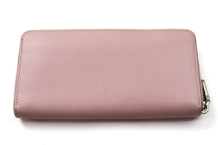 【新品】COACH　コーチ　長財布　ラウンドジップ 　ピンク COACH コーチ ベルト付き ラウンドジップ 長財布 ピンク系【中古