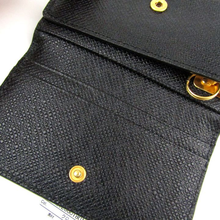 タケオキクチ キーケース 未使用 5連 本革 エンボスレザー ブランド 黒 