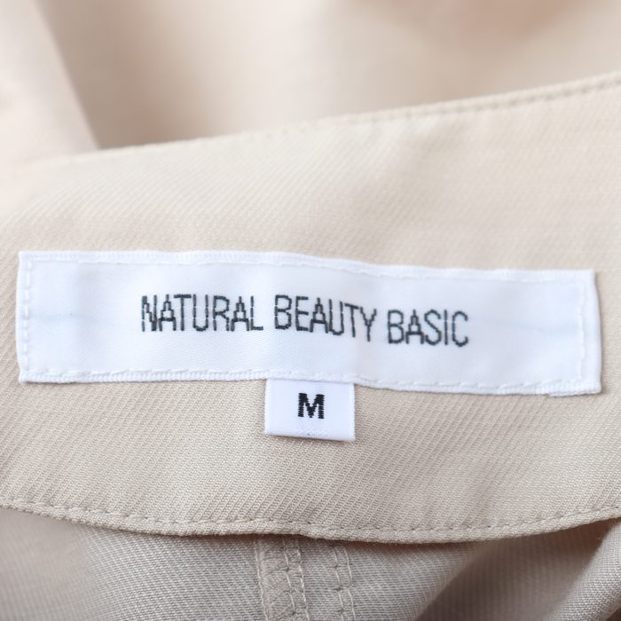 ナチュラルビューティーベーシック ブルゾン ジャケット アウター ノーカラー レディース Mサイズ ベージュ NATURAL BEAUTY BASIC  【中古】｜NATURAL BEAUTY BASIC｜店舗買取｜ジャケット/アウター＞その他アウター｜USEDのアパレル通販サイト -  SMASELL（スマセル）