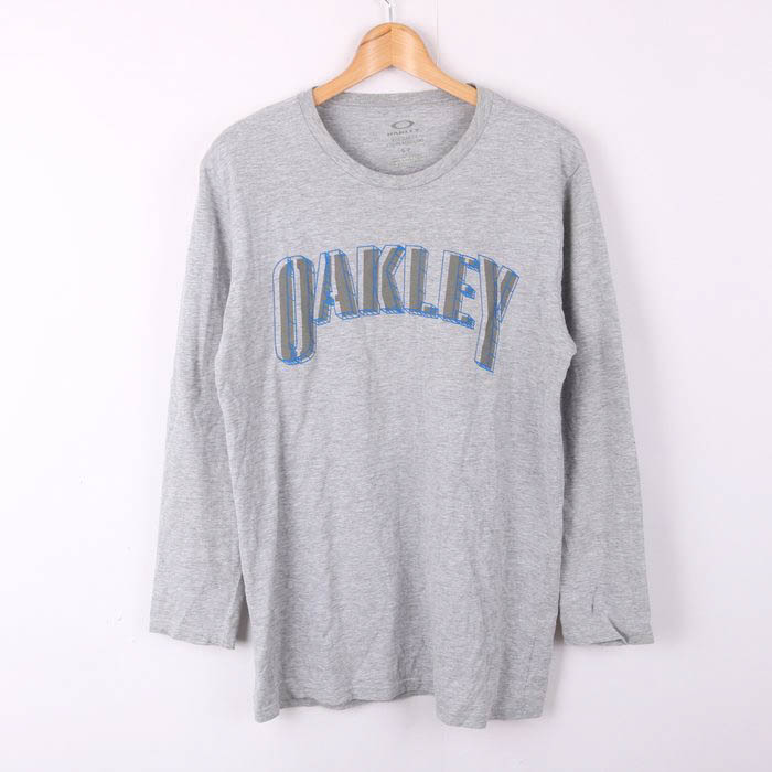 オークリー 長袖Tシャツ ロゴT レギュラーフィット スポーツウエア メンズ Sサイズ グレー OAKLEY 【中古】｜OAKLEY｜店舗買取｜トップス＞Tシャツ/カットソー｜USEDのアパレル通販サイト  - SMASELL（スマセル）