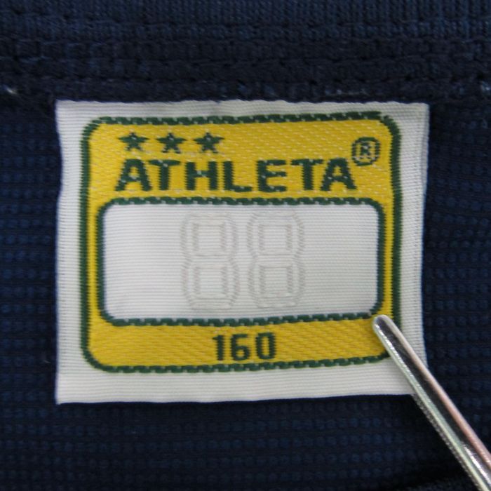 ATHLETA ピステ・ウィンドブレーカー ネイビー/イエローとオレンジ